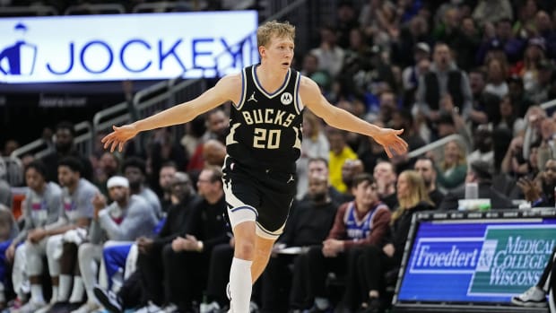 Milwaukee Bucks guard AJ Green (20) reacts after scoring a basket